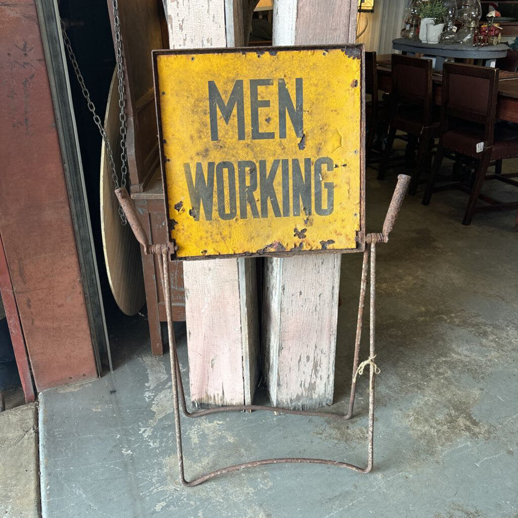 MEN WORKING SIGN